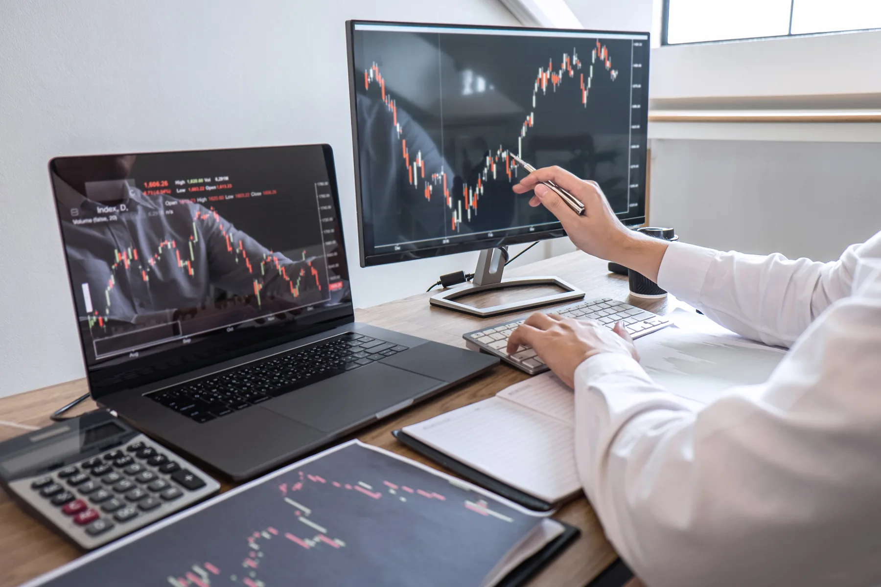 Business owner reviewing sales data and financial charts