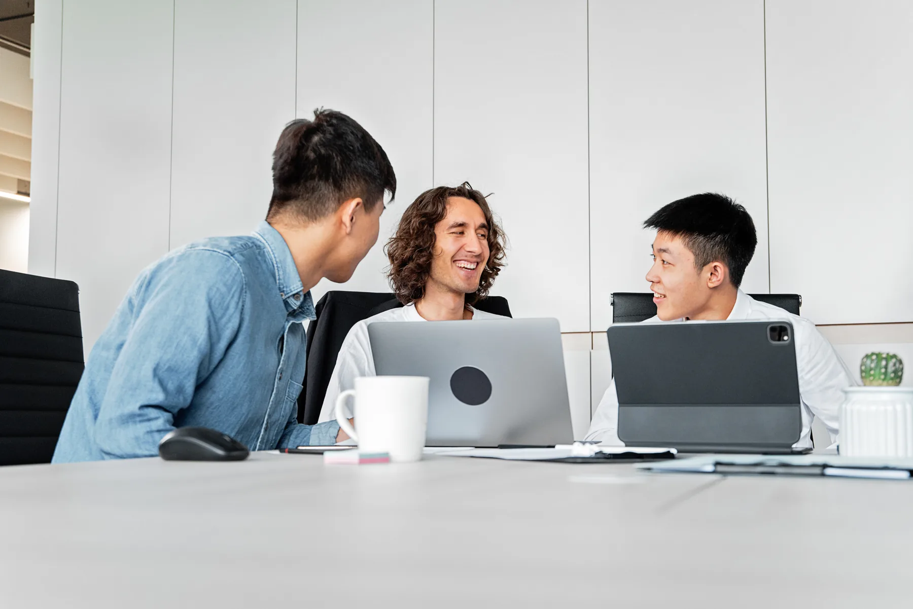 Startup team collaborating around a table